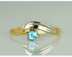  золотое кольцо с голубым топазом